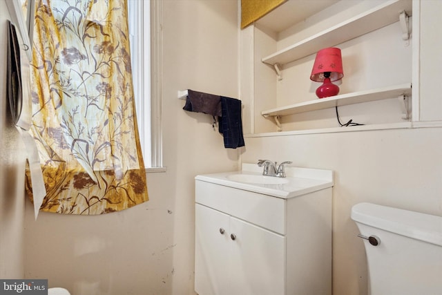 half bath with toilet and vanity
