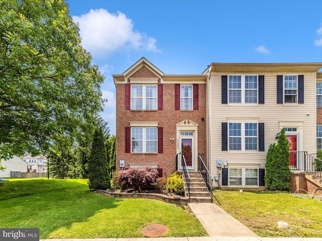 5500 Upshur Sq, Frederick, MD 21703 - view of property featuring a front lawn and brick siding