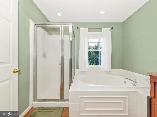 5500 Upshur Sq, Frederick, MD 21703 - full bathroom featuring a shower stall, a garden tub, vanity, and recessed lighting