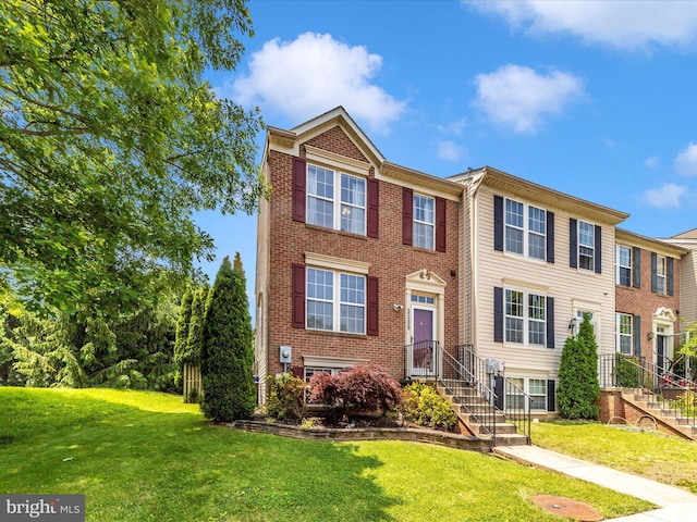 5500 Upshur Sq, Frederick, MD 21703 - multi unit property with a front lawn and brick siding