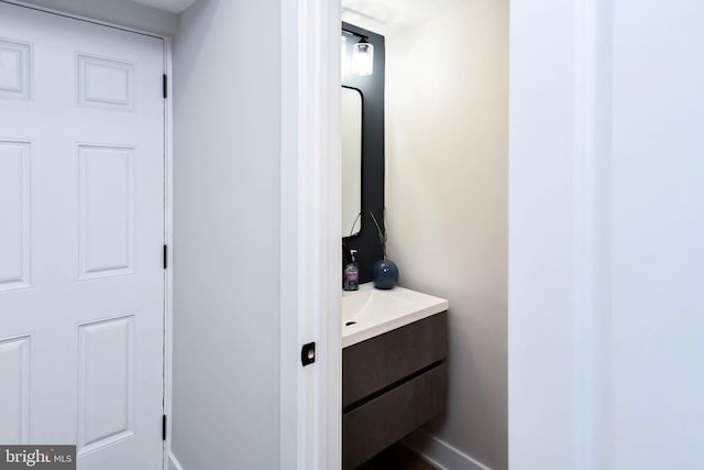 711 57th Pl NE, Washington, DC 20019 - bathroom with vanity and baseboards