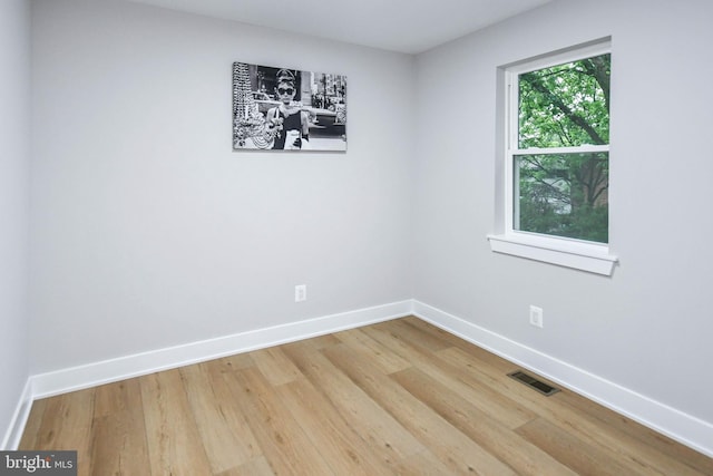 711 57th Pl NE, Washington, DC 20019 - empty room featuring baseboards and light wood-style floors