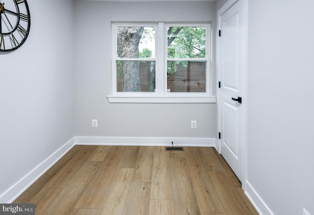 711 57th Pl NE, Washington, DC 20019 - unfurnished room with wood finished floors and baseboards