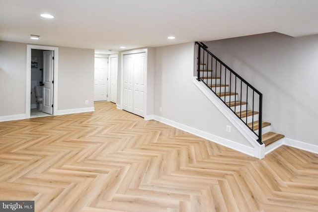 711 57th Pl NE, Washington, DC 20019 - finished below grade area featuring baseboards, stairway, and recessed lighting