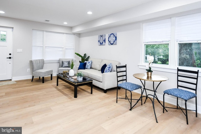 711 57th Pl NE, Washington, DC 20019 - living area featuring wood finished floors, recessed lighting, and baseboards
