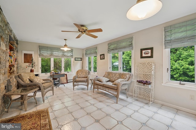 1 Locust Ln, Media, PA 19063 - living area featuring plenty of natural light, a ceiling fan, and baseboards