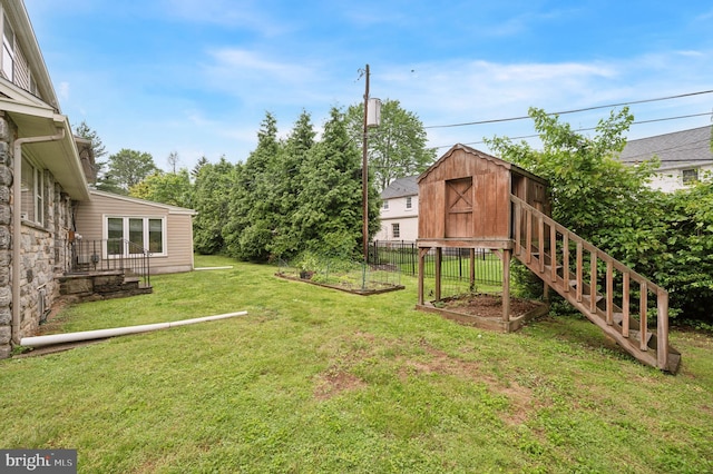 1 Locust Ln, Media, PA 19063 - view of green lawn featuring a garden and an outdoor structure