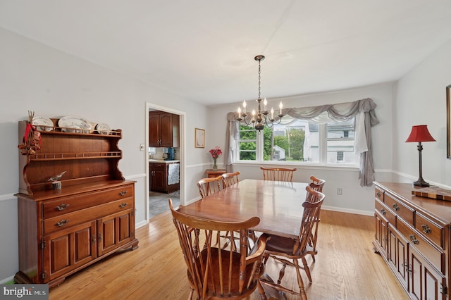 1 Locust Ln, Media, PA 19063 - dining room with light wood finished floors and a chandelier