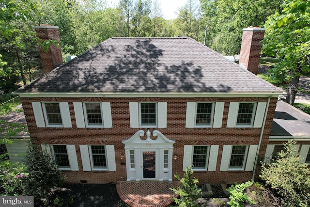 505 Hillcrest Ave, State College, PA 16803 - view of front of house with a chimney, roof with shingles, and brick siding