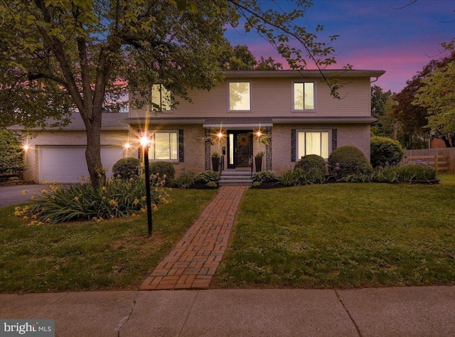 89 Wellington Blvd, Wyomissing, PA 19610 - traditional-style house with a garage and asphalt driveway