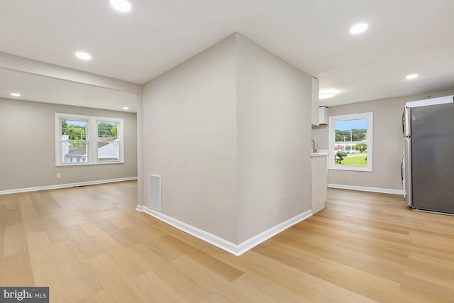 1106 Fiji Ave, Landover, MD 20785 - hallway featuring light wood finished floors, recessed lighting, and baseboards