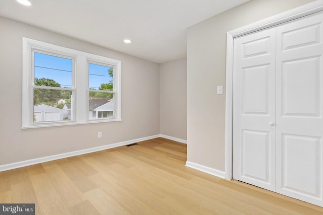 1106 Fiji Ave, Landover, MD 20785 - unfurnished bedroom with light wood-style flooring, baseboards, recessed lighting, and a closet