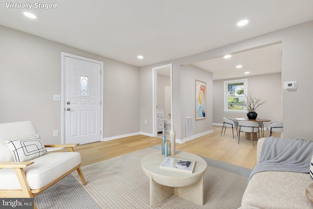 1106 Fiji Ave, Landover, MD 20785 - living area featuring light wood-style floors, recessed lighting, and baseboards