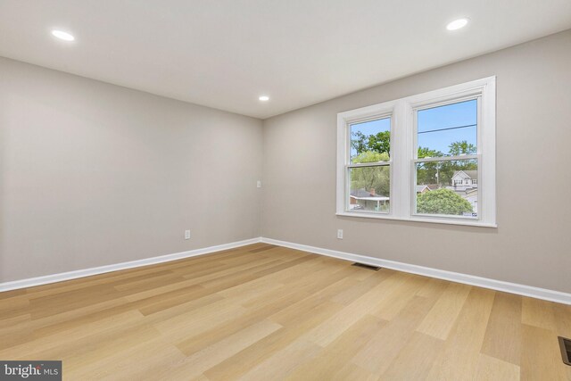 1106 Fiji Ave, Landover, MD 20785 - unfurnished room featuring baseboards, light wood-style flooring, and recessed lighting
