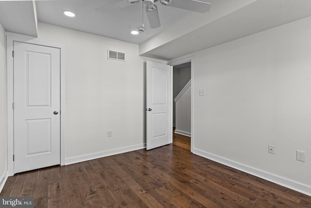 unfurnished bedroom with dark wood-style flooring, baseboards, ceiling fan, and recessed lighting
