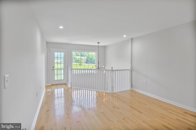 8118 Chapel Cove Dr, Laurel, MD 20707 - unfurnished room with light wood-style floors, baseboards, a chandelier, and recessed lighting