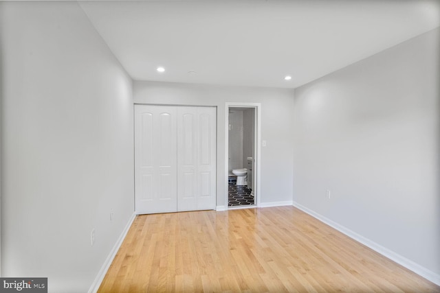 8118 Chapel Cove Dr, Laurel, MD 20707 - unfurnished bedroom featuring baseboards, light wood finished floors, recessed lighting, a closet, and ensuite bathroom