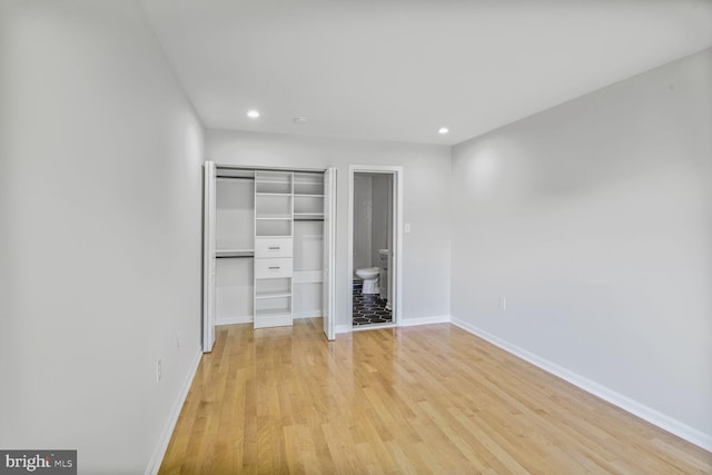 8118 Chapel Cove Dr, Laurel, MD 20707 - unfurnished bedroom with light wood-style floors, baseboards, recessed lighting, and a closet
