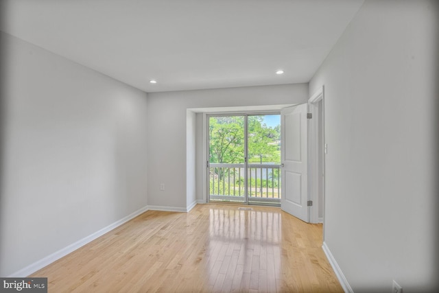 8118 Chapel Cove Dr, Laurel, MD 20707 - empty room featuring light wood-type flooring, baseboards, and recessed lighting