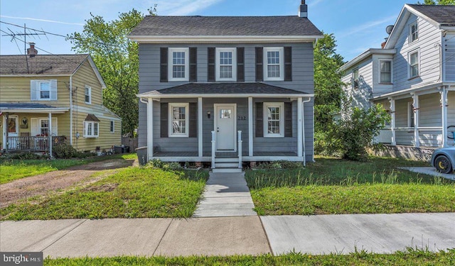 212 Broad St, Elmer, NJ 08318 - view of front facade with covered porch and a chimney
