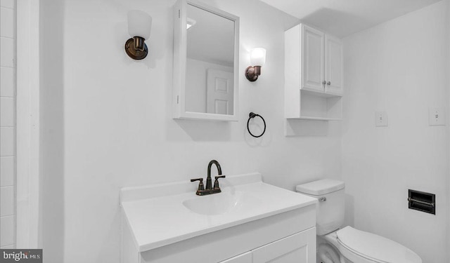 212 Broad St, Elmer, NJ 08318 - bathroom featuring toilet and vanity