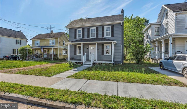 212 Broad St, Elmer, NJ 08318 - view of front of house with covered porch and a chimney
