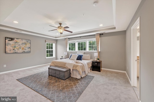 9830 Forge Valley Ct, Perry Hall, MD 21128 - bedroom with a tray ceiling, light carpet, baseboards, and recessed lighting