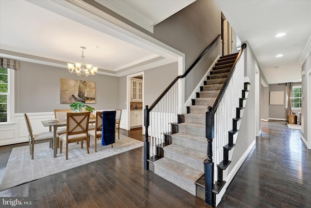 9830 Forge Valley Ct, Perry Hall, MD 21128 - stairs featuring wood-type flooring, a chandelier, recessed lighting, ornamental molding, and baseboards