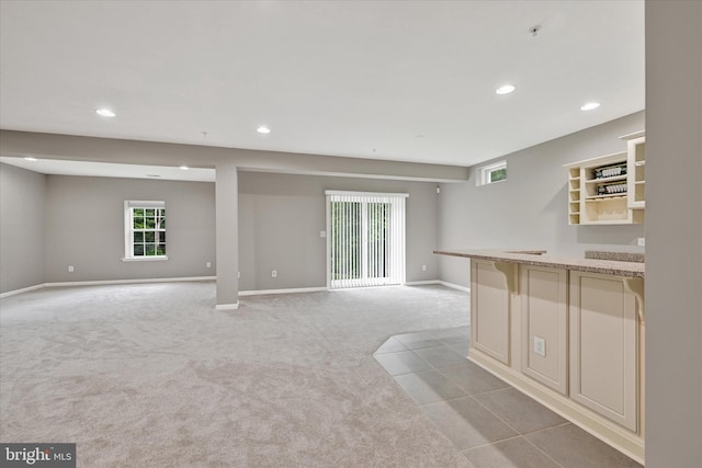 9830 Forge Valley Ct, Perry Hall, MD 21128 - unfurnished living room with light carpet, baseboards, healthy amount of natural light, and recessed lighting