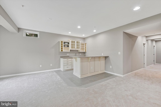 9830 Forge Valley Ct, Perry Hall, MD 21128 - kitchen featuring open shelves, light colored carpet, baseboards, and recessed lighting