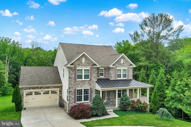 9830 Forge Valley Ct, Perry Hall, MD 21128 - view of front of property featuring stone siding, covered porch, a garage, and driveway
