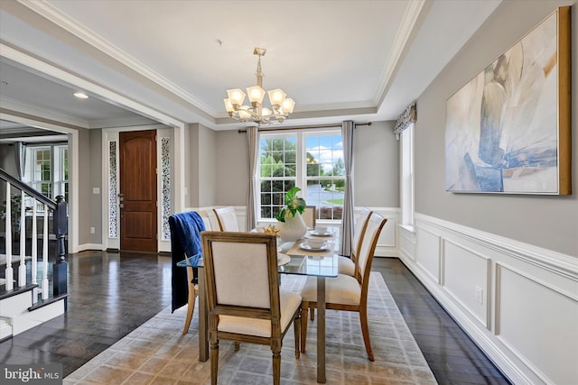 9830 Forge Valley Ct, Perry Hall, MD 21128 - dining room featuring a chandelier, plenty of natural light, stairway, a wainscoted wall, and a tray ceiling