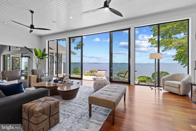 2514 Lyon Dr, Annapolis, MD 21403 - living area featuring a ceiling fan, wood finished floors, and a water view