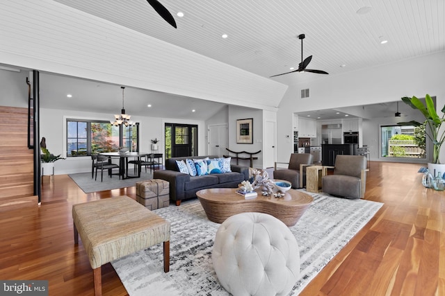 2514 Lyon Dr, Annapolis, MD 21403 - living room featuring ceiling fan, a chandelier, light wood finished floors, vaulted ceiling, and recessed lighting