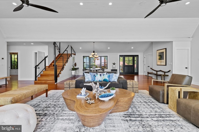 2514 Lyon Dr, Annapolis, MD 21403 - living room with a ceiling fan, wood finished floors, stairway, healthy amount of natural light, and vaulted ceiling