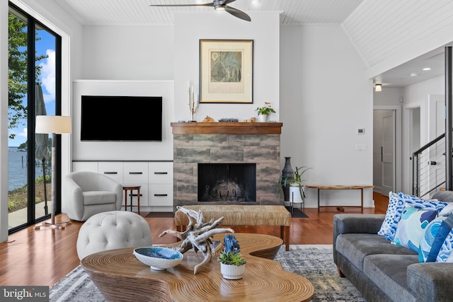 2514 Lyon Dr, Annapolis, MD 21403 - living room with wood finished floors, ceiling fan, and a fireplace