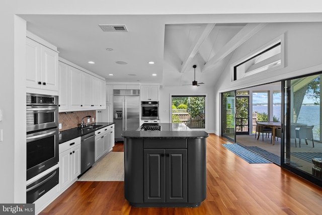 2514 Lyon Dr, Annapolis, MD 21403 - kitchen featuring appliances with stainless steel finishes, a warming drawer, a sink, recessed lighting, and a kitchen island