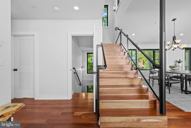 2514 Lyon Dr, Annapolis, MD 21403 - staircase with healthy amount of natural light, a chandelier, wood finished floors, recessed lighting, and baseboards
