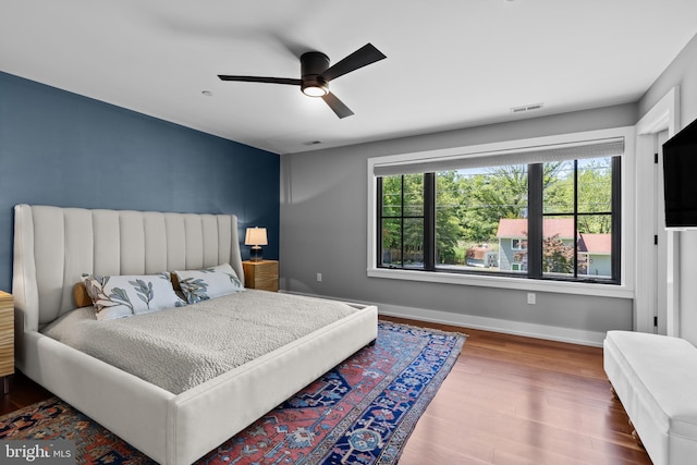 2514 Lyon Dr, Annapolis, MD 21403 - bedroom with wood finished floors, baseboards, and ceiling fan