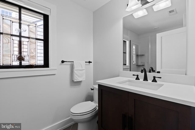 2514 Lyon Dr, Annapolis, MD 21403 - bathroom with vanity, baseboards, and toilet