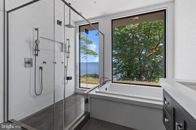 2514 Lyon Dr, Annapolis, MD 21403 - full bath with a stall shower, a bath, vanity, a water view, and concrete flooring