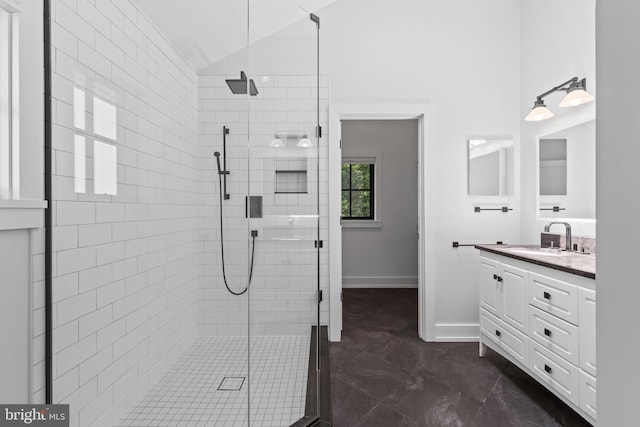 2514 Lyon Dr, Annapolis, MD 21403 - bathroom with a shower stall, vanity, lofted ceiling, and baseboards