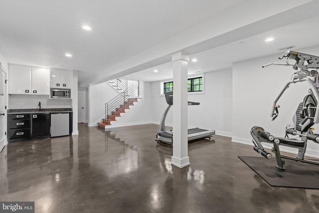 2514 Lyon Dr, Annapolis, MD 21403 - workout room with recessed lighting, baseboards, and a sink