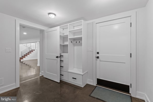 2514 Lyon Dr, Annapolis, MD 21403 - mudroom with finished concrete flooring and baseboards