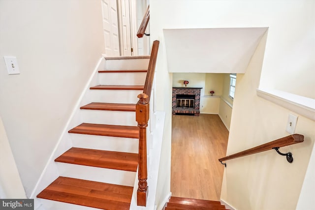 958 Tympani, Herndon, VA 20170 - stairway featuring wood finished floors and a brick fireplace