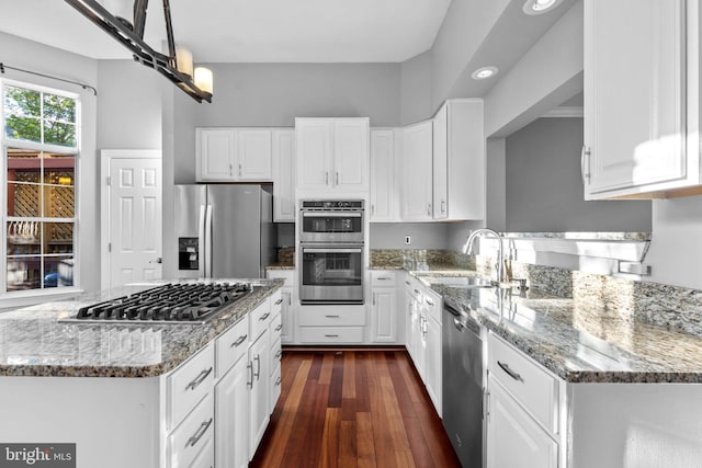 20580 Willoughby Sq, Sterling, VA 20165 - kitchen with a sink, stainless steel appliances, white cabinets, dark wood-style floors, and recessed lighting