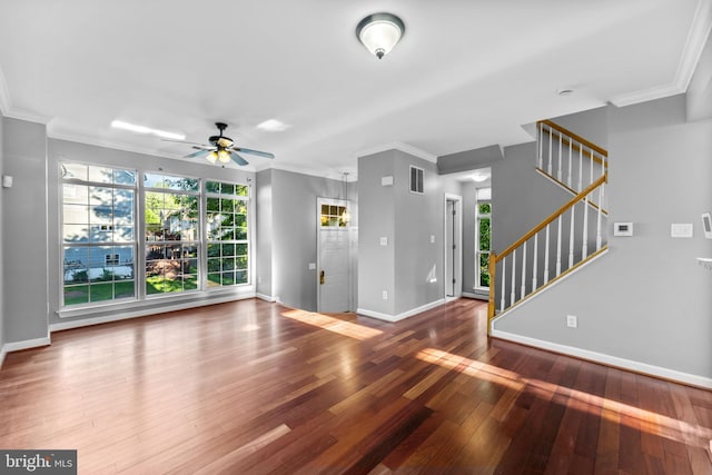 20580 Willoughby Sq, Sterling, VA 20165 - unfurnished living room featuring ceiling fan, hardwood / wood-style flooring, ornamental molding, baseboards, and stairs