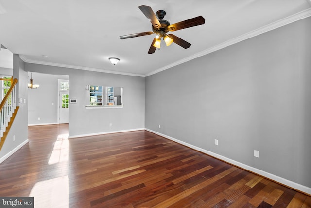 20580 Willoughby Sq, Sterling, VA 20165 - empty room with wood finished floors, stairs, a ceiling fan, baseboards, and ornamental molding