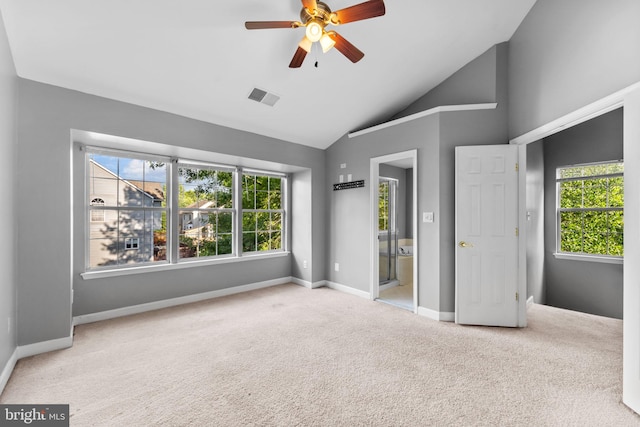 20580 Willoughby Sq, Sterling, VA 20165 - unfurnished bedroom with lofted ceiling, carpet flooring, multiple windows, and baseboards