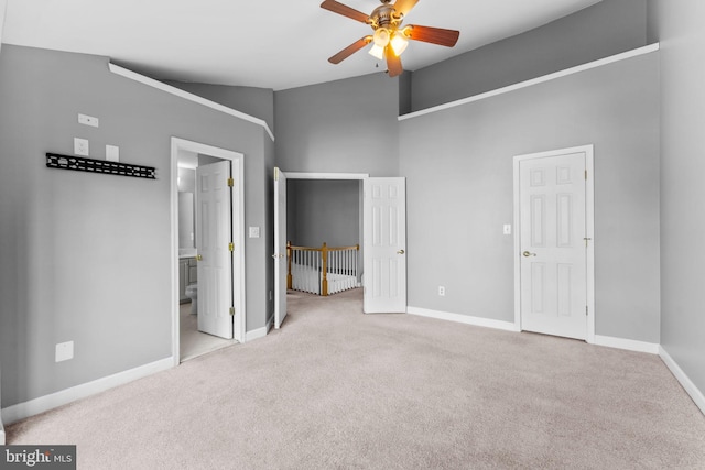 20580 Willoughby Sq, Sterling, VA 20165 - unfurnished bedroom featuring carpet, baseboards, ensuite bath, and high vaulted ceiling